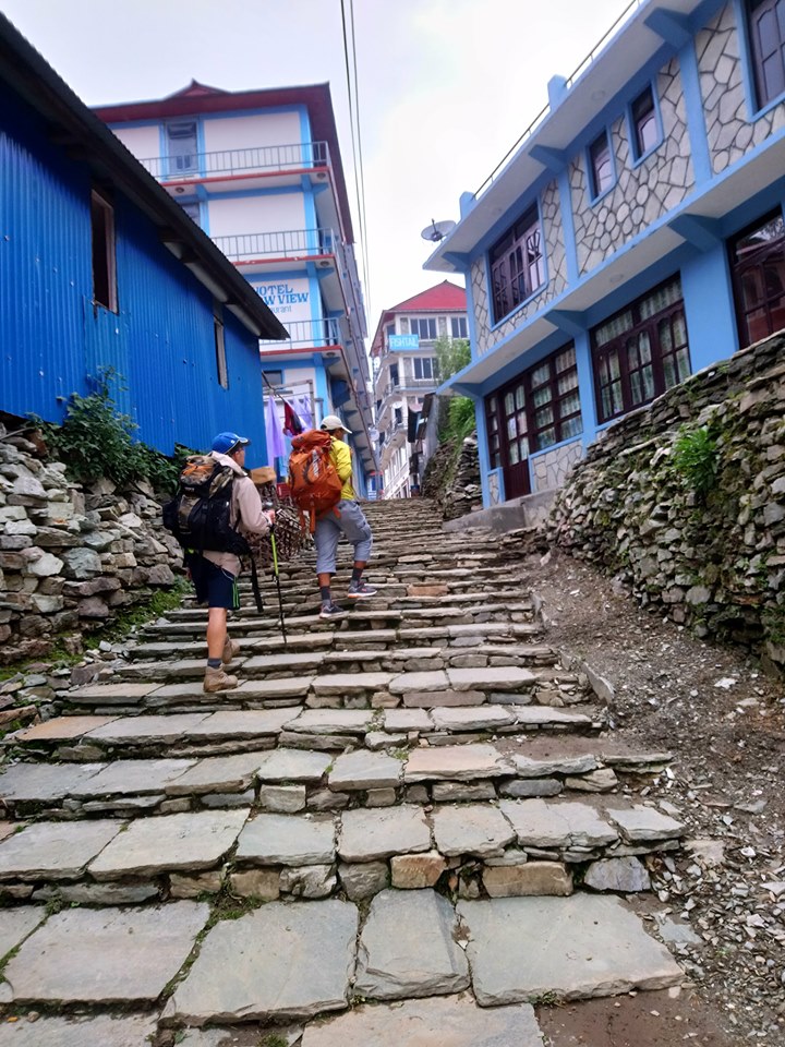 More steps to negotiate with to reach our guesthouse. It must have come with a better view... -- with Bhakti Devkota.
